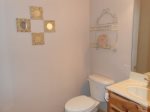 The half bath is on the main floor and off of the living area.